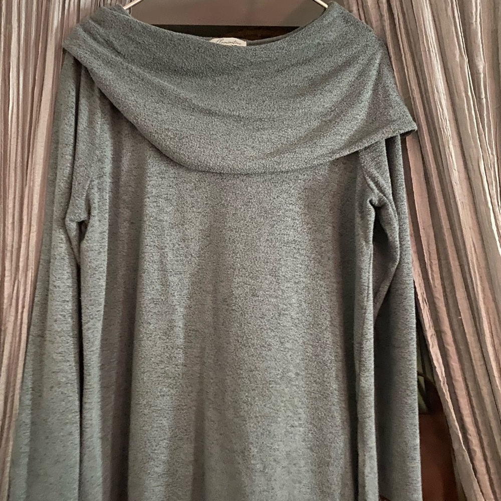 Top with flowy neckline